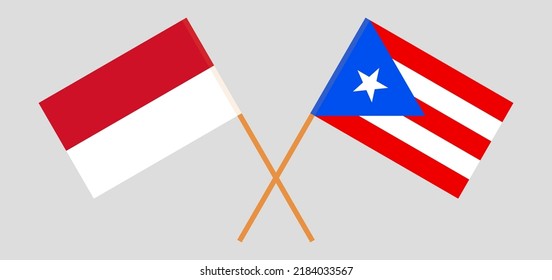 Crossed flags of Indonesia and Puerto Rico. Official colors. Correct proportion. Vector illustration
