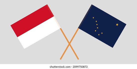 Crossed flags of Indonesia and the State of Alaska. Official colors. Correct proportion. Vector illustration
