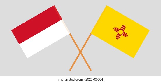 Crossed flags of Indonesia and the State of New Mexico. Official colors. Correct proportion