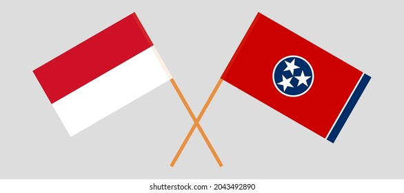 Crossed flags of Indonesia and the State of Tennessee. Official colors. Correct proportion
