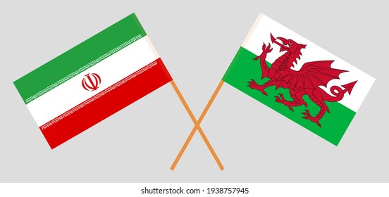 Crossed flags of Iran and Wales. Official colors. Correct proportion