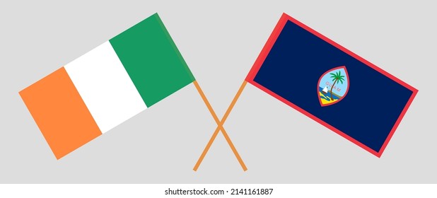 Crossed flags of Ireland and Guam. Official colors. Correct proportion. Vector illustration
