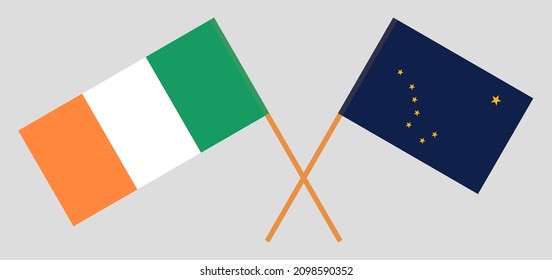 Crossed flags of Ireland and the State of Alaska. Official colors. Correct proportion. Vector illustration
