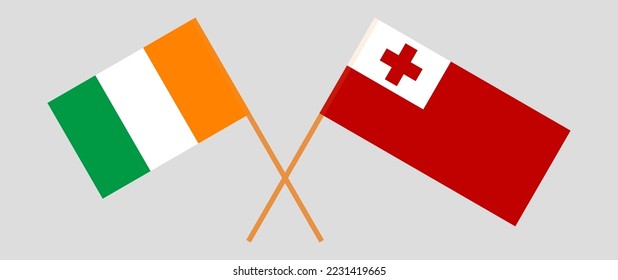Crossed flags of Ivory Coast and Tonga. Official colors. Correct proportion. Vector illustration
