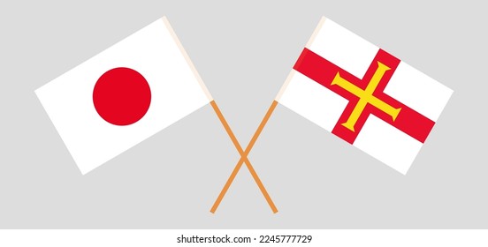 Crossed flags of Japan and Bailiwick of Guernsey. Official colors. Correct proportion. Vector illustration
