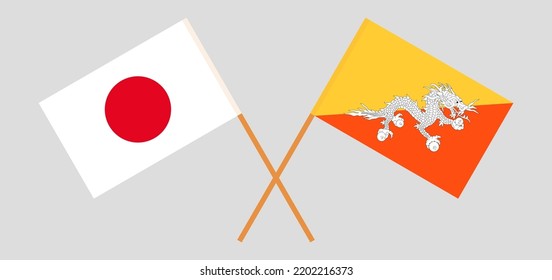 Crossed flags of Japan and Bhutan. Official colors. Correct proportion. Vector illustration
