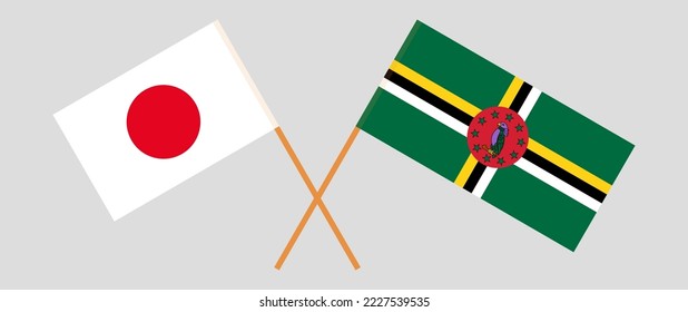 Crossed flags of Japan and Dominica. Official colors. Correct proportion. Vector illustration
