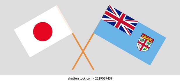 Crossed flags of Japan and Fiji. Official colors. Correct proportion. Vector illustration

