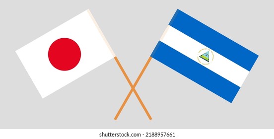 Crossed flags of Japan and Nicaragua. Official colors. Correct proportion. Vector illustration
