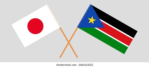 Crossed flags of Japan and South Sudan. Official colors. Correct proportion