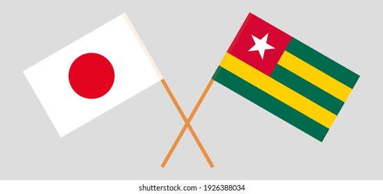 Crossed flags of Japan and Togo. Official colors. Correct proportion