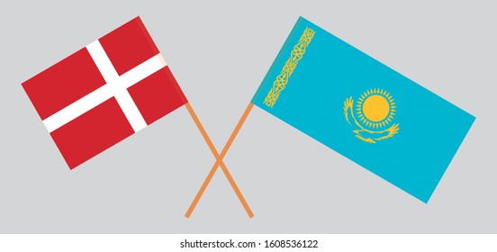 Crossed flags of Kazakhstan and Denmark. Official colors. Correct proportion. Vector illustration
