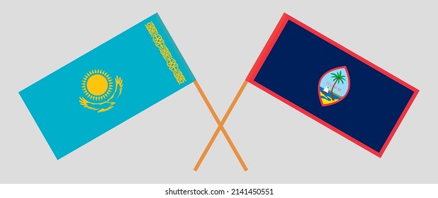 Crossed flags of Kazakhstan and Guam. Official colors. Correct proportion. Vector illustration
