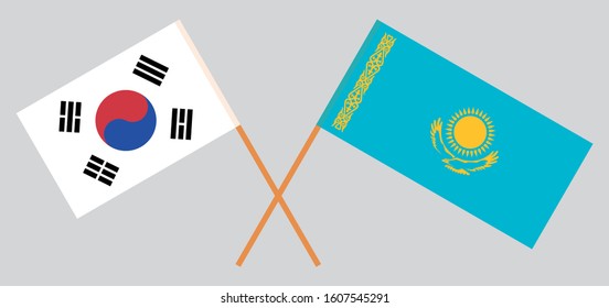 Crossed flags of Kazakhstan and South Korea. Official colors. Correct proportion. Vector illustration
