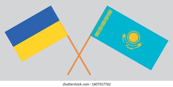 Crossed flags of Kazakhstan and the Ukraine. Official colors. Correct proportion. Vector illustration
