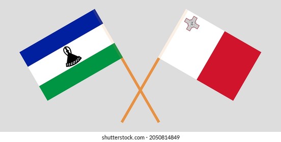 Crossed flags of the Kingdom of Lesotho and Malta. Official colors. Correct proportion