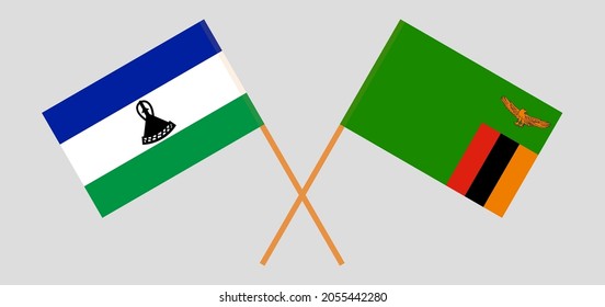 Crossed flags of the Kingdom of Lesotho and the Republic of Zambia. Official colors. Correct proportion