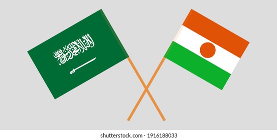 Crossed flags of the Kingdom of Saudi Arabia and the Niger