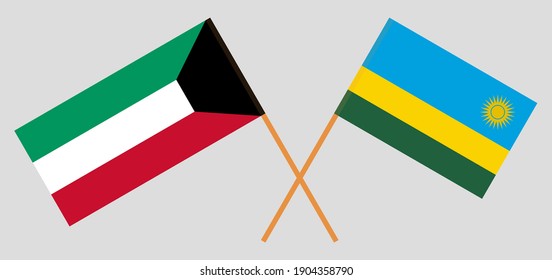 Crossed flags of Kuwait and Rwanda
