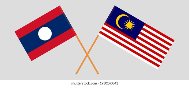 Crossed flags of Laos and Malaysia. Official colors. Correct proportion