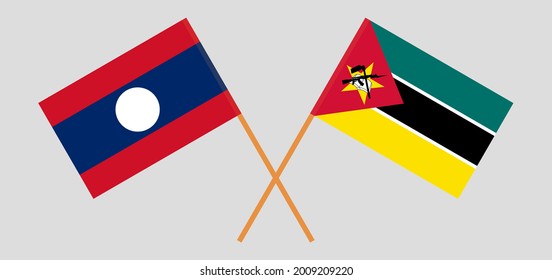 Crossed flags of Laos and Mozambique. Official colors. Correct proportion