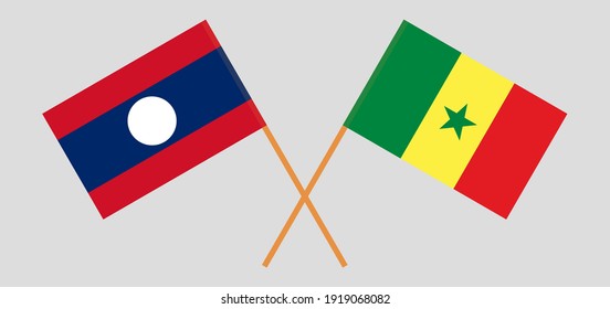 Crossed flags of Laos and Senegal