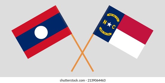 Crossed flags of Laos and The State of North Carolina. Official colors. Correct proportion. Vector illustration
