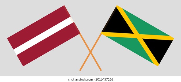 Crossed flags of Latvia and Jamaica. Official colors. Correct proportion