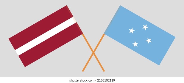 Crossed flags of Latvia and Micronesia. Official colors. Correct proportion. Vector illustration
