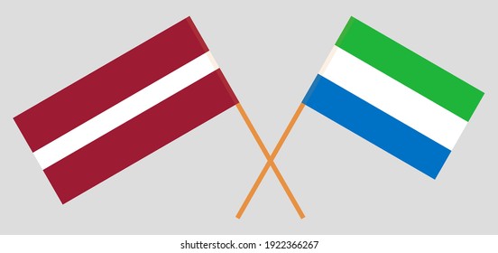 Crossed flags of Latvia and Sierra Leone. Official colors. Correct proportion