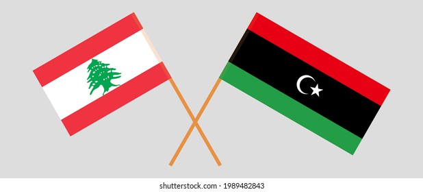 Gekreuzte Flaggen des Libanon und Libyens. Offizielle Farben. Richtiger Anteil
