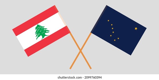 Crossed flags of the Lebanon and the State of Alaska. Official colors. Correct proportion. Vector illustration
