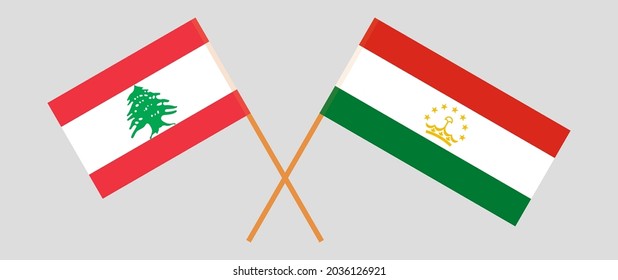 Crossed flags of the Lebanon and Tajikistan. Official colors. Correct proportion