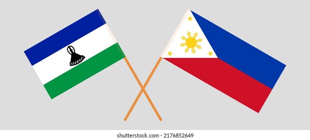 Crossed flags of Lesotho and the Philippines. Official colors. Correct proportion. Vector illustration
