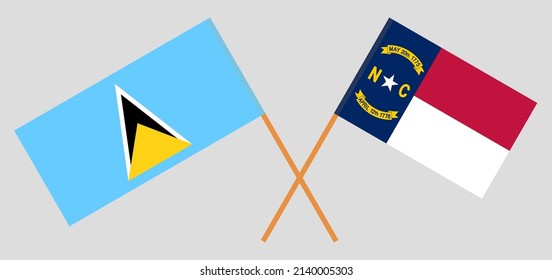 Crossed flags of Lesotho and The State of North Carolina. Official colors. Correct proportion. Vector illustration
