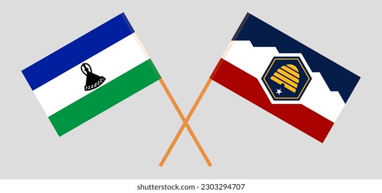 Crossed flags of Lesotho and The State of Utah. Official colors. Correct proportion. Vector illustration
