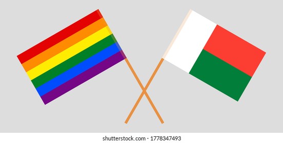 Crossed flags of LGBT and Madagascar. Official colors. Correct proportion. Vector illustration
