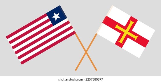 Crossed flags of Liberia and Bailiwick of Guernsey. Official colors. Correct proportion. Vector illustration
