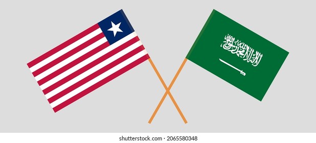 Crossed flags of Liberia and the Kingdom of Saudi Arabia. Official colors. Correct proportion