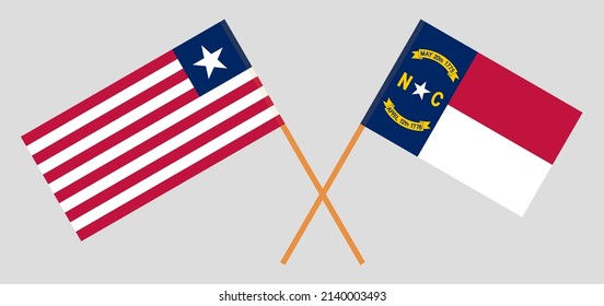 Crossed flags of Liberia and The State of North Carolina. Official colors. Correct proportion. Vector illustration
