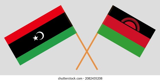 Crossed flags of Libya and Malawi. Official colors. Correct proportion