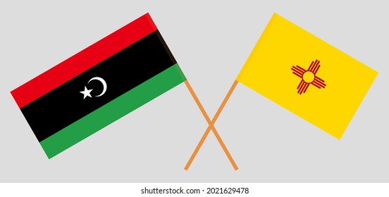 Crossed flags of Libya and the State of New Mexico. Official colors. Correct proportion