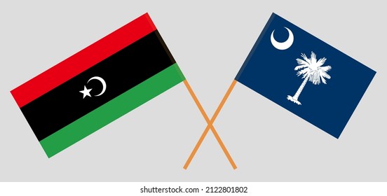 Banderas cruzadas de Libia y El estado de Carolina del Sur. Colores oficiales. Proporción correcta. Ilustración del vector
