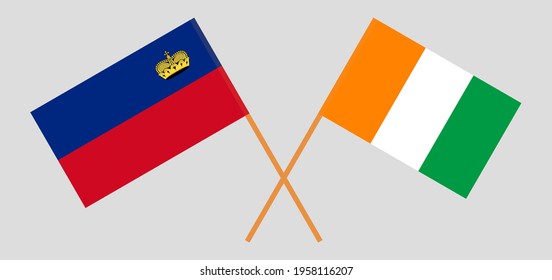 Crossed flags of Liechtenstein and Republic of Ivory Coast. Official colors. Correct proportion