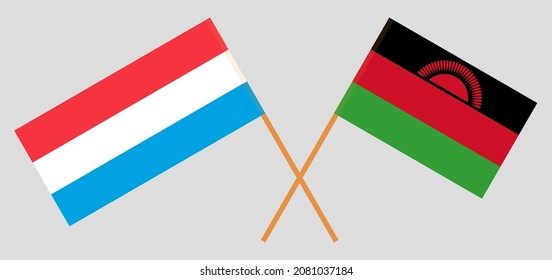 Crossed flags of Luxembourg and Malawi. Official colors. Correct proportion