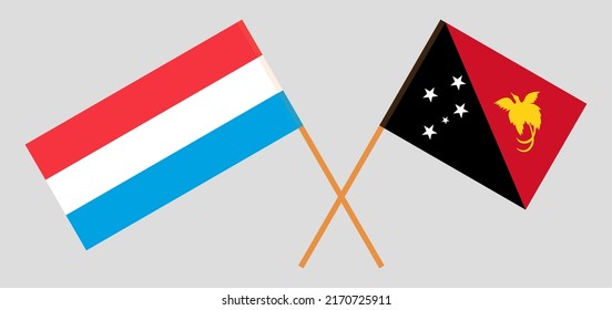 Crossed flags of Luxembourg and Papua New Guinea. Official colors. Correct proportion. Vector illustration
