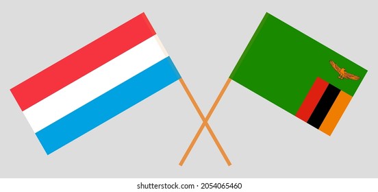 Crossed flags of Luxembourg and Republic of Zambia. Official colors. Correct proportion