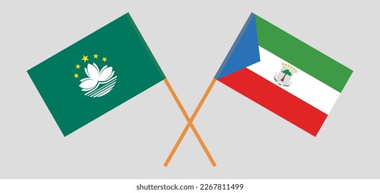 Gekreuzte Flaggen von Macau und Äquatorialguinea. Offizielle Farben. Richtiger Anteil. Vektorgrafik
