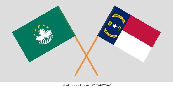 Crossed flags of Macau and The State of North Carolina. Official colors. Correct proportion. Vector illustration
