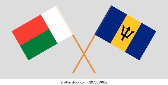 Crossed flags of Madagascar and Barbados. Official colors. Correct proportion. Vector illustration
